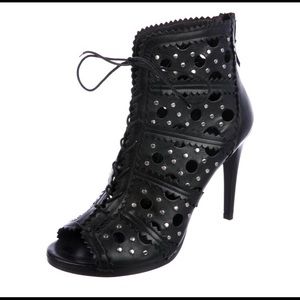 Stuart Weitzman Leather Lasercut zipper booties